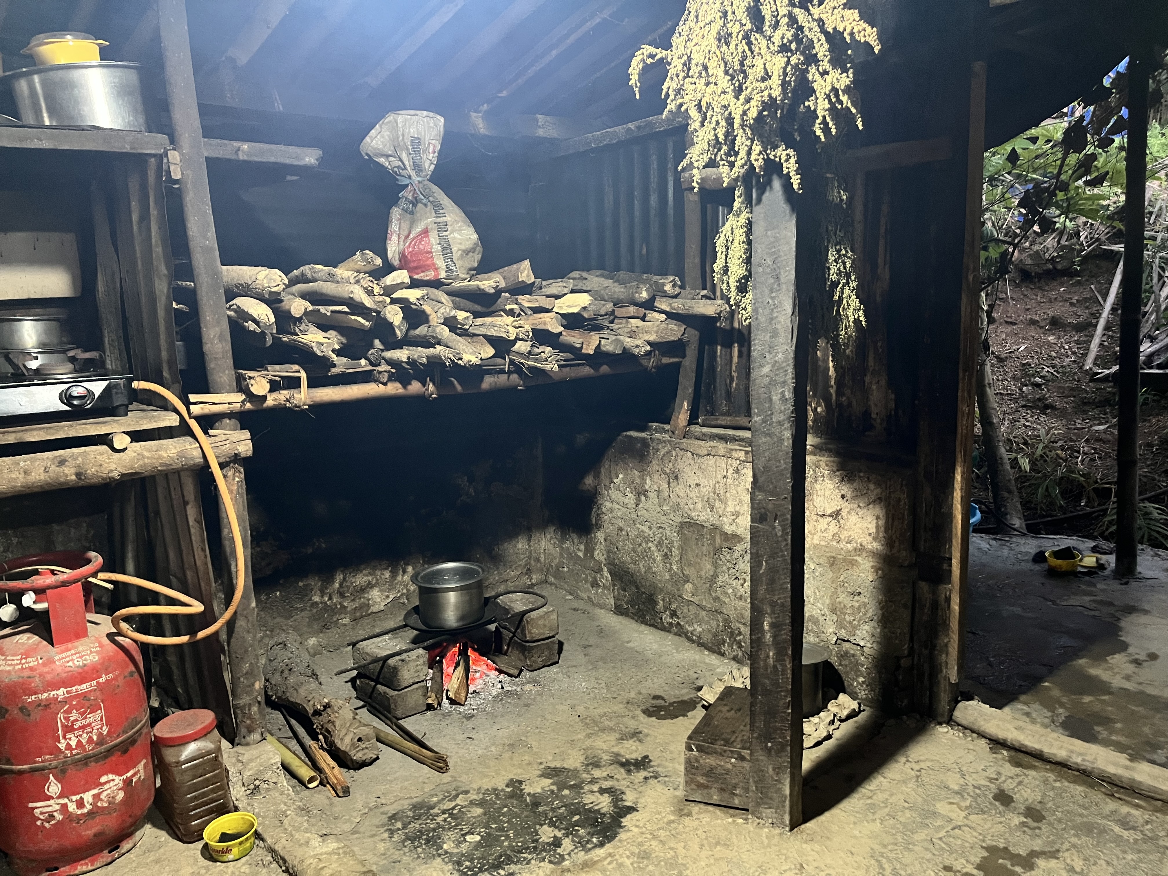 Camp kitchen with open fire, Mizoram