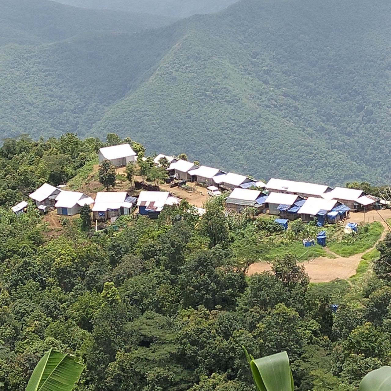 Aerial view of a refugee camp on a ridge, Mizoram
